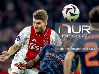 AFC Ajax Amsterdam defender Anton Gaaei and FC Utrecht midfielder Taylor Booth participate in the match between Ajax and Utrecht at the Joha...