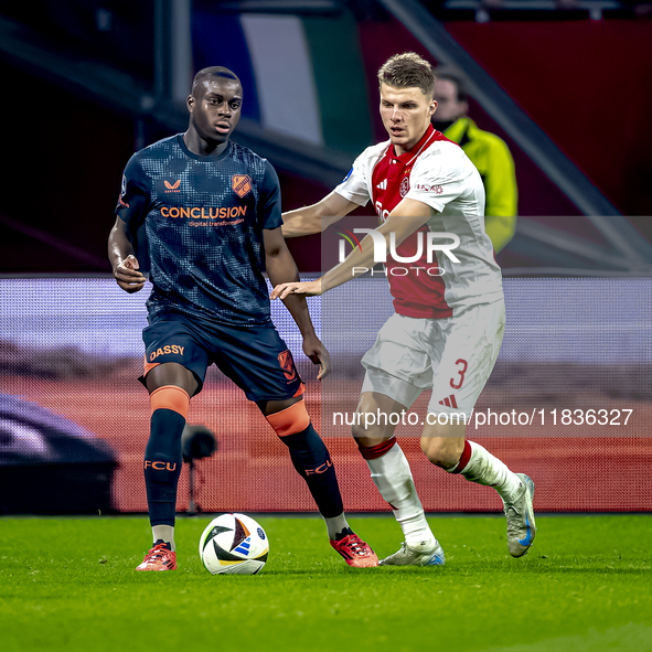 FC Utrecht forward Yoann Cathline and AFC Ajax Amsterdam defender Anton Gaaei participate in the match between Ajax and Utrecht at the Johan...