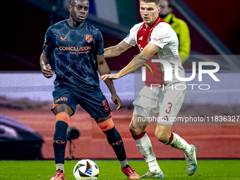 FC Utrecht forward Yoann Cathline and AFC Ajax Amsterdam defender Anton Gaaei participate in the match between Ajax and Utrecht at the Johan...