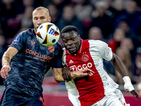 FC Utrecht defender Mike van der Hoorn and AFC Ajax Amsterdam forward Brian Brobbey play during the match between Ajax and Utrecht at the Jo...