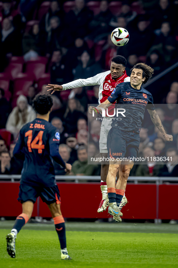 AFC Ajax Amsterdam defender Jorrel Hato and FC Utrecht midfielder Zidane Iqbal play during the match between Ajax and Utrecht at the Johan C...