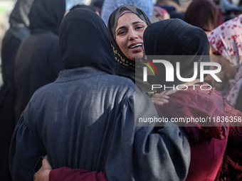 People mourn Palestinians killed in an Israeli strike at Nasser Hospital in Khan Younis in the southern Gaza Strip on December 5, 2024. (