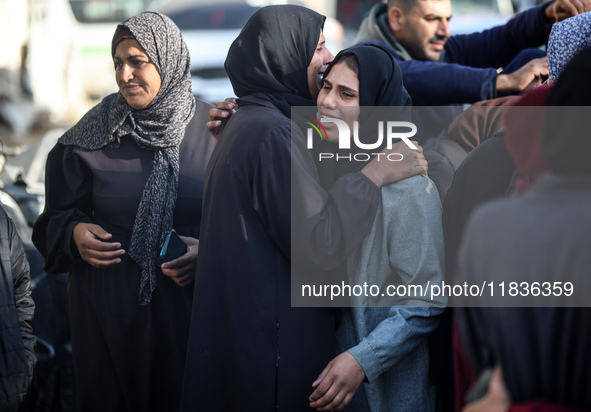 People mourn Palestinians killed in an Israeli strike at Nasser Hospital in Khan Younis in the southern Gaza Strip on December 5, 2024. 