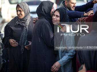 People mourn Palestinians killed in an Israeli strike at Nasser Hospital in Khan Younis in the southern Gaza Strip on December 5, 2024. (