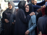 People mourn Palestinians killed in an Israeli strike at Nasser Hospital in Khan Younis in the southern Gaza Strip on December 5, 2024. (