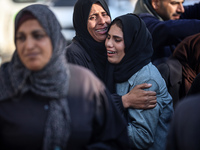 People mourn Palestinians killed in an Israeli strike at Nasser Hospital in Khan Younis in the southern Gaza Strip on December 5, 2024. (