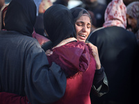 People mourn Palestinians killed in an Israeli strike at Nasser Hospital in Khan Younis in the southern Gaza Strip on December 5, 2024. (