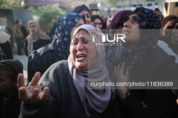 People mourn Palestinians killed in an Israeli strike at Nasser Hospital in Khan Younis in the southern Gaza Strip on December 5, 2024. 