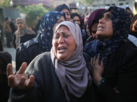 People mourn Palestinians killed in an Israeli strike at Nasser Hospital in Khan Younis in the southern Gaza Strip on December 5, 2024. (