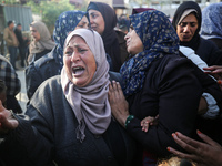 People mourn Palestinians killed in an Israeli strike at Nasser Hospital in Khan Younis in the southern Gaza Strip on December 5, 2024. (