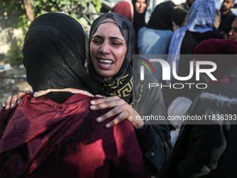 People mourn Palestinians killed in an Israeli strike at Nasser Hospital in Khan Younis in the southern Gaza Strip on December 5, 2024. (