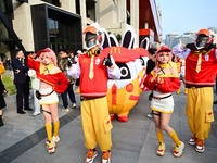 Products from the collaboration between the game Zenless Zone Zero and McDonald's parade through the streets in Shanghai, China, on December...