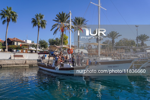 Ships and boats offer tourists trips along the Mediterranean coast and are moored in the marina in Side, Turkey, on November 7, 2024. 