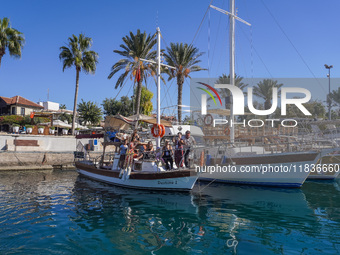 Ships and boats offer tourists trips along the Mediterranean coast and are moored in the marina in Side, Turkey, on November 7, 2024. (