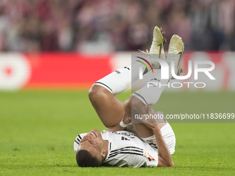 Kylian Mbappe centre-forward of Real Madrid and France lies injured on the pitch during the La Liga match between Athletic Club and Real Mad...