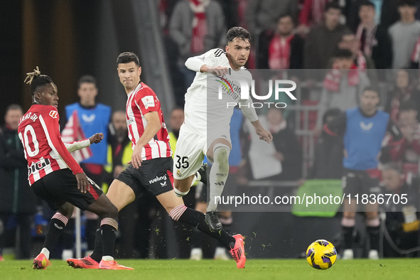 Raul Asencio centre-back of Real Madrid and Spain in action during the La Liga match between Athletic Club and Real Madrid CF at Estadio de...