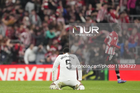 Jude Bellingham central midfield of Real Madrid and England dejected after Athletic second goal during the La Liga match between Athletic Cl...