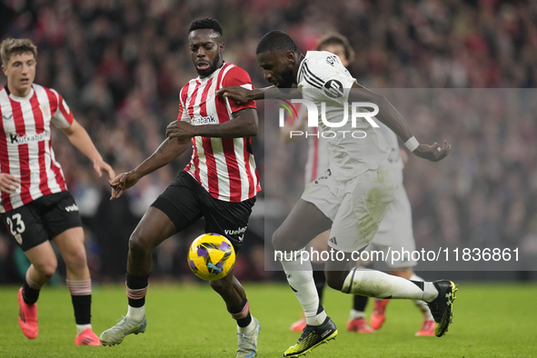 Antonio Rudiger centre-back of Real Madrid and Germany and Inaki Williams right winger of Athletic Club and Ghana compete for the ball durin...