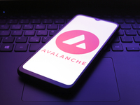 The Avalanche logo appears on the screen of a smartphone in Reno, United States, on December 5, 2024. (