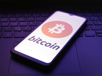 The Bitcoin logo appears on the screen of a smartphone in Reno, United States, on December 5, 2024. (