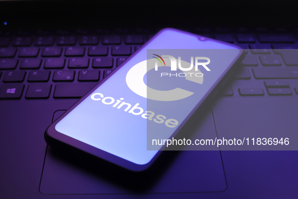 The Coinbase logo appears on the screen of a smartphone in Reno, United States, on December 5, 2024. 