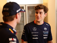 Max Verstappen of Red Bull Racing and Franco Colapinto of Williams ahead of the Formula 1 Austrian Grand Prix at Yas Marina Circuit in Abu D...