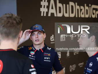 Nico Hulkenberg of Haas, Max Verstappen of Red Bull Racing and Franco Colapinto of Williams ahead of the Formula 1 Austrian Grand Prix at Ya...