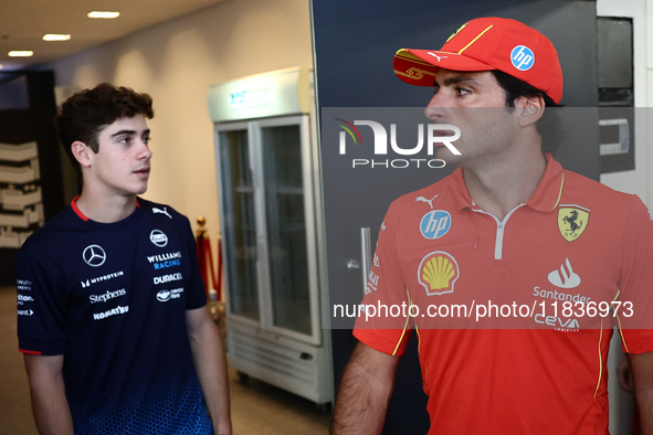 Franco Colapinto of Williams and Carlos Sainz of Ferrari ahead of the Formula 1 Austrian Grand Prix at Yas Marina Circuit in Abu Dhabi, Unit...