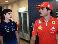 Franco Colapinto of Williams and Carlos Sainz of Ferrari ahead of the Formula 1 Austrian Grand Prix at Yas Marina Circuit in Abu Dhabi, Unit...