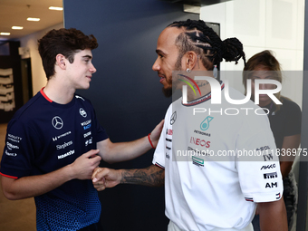 Franco Colapinto of Williams and Lewis Hamilton of Mercedes ahead of the Formula 1 Austrian Grand Prix at Yas Marina Circuit in Abu Dhabi, U...