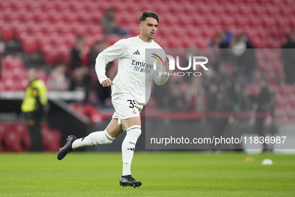 Raul Asencio centre-back of Real Madrid and Spain during the warm-up before the La Liga match between Athletic Club and Real Madrid CF at Es...