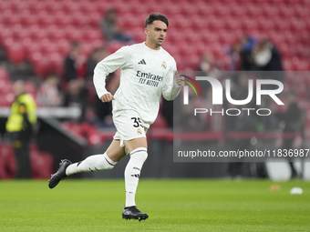 Raul Asencio centre-back of Real Madrid and Spain during the warm-up before the La Liga match between Athletic Club and Real Madrid CF at Es...