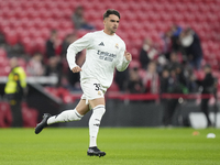 Raul Asencio centre-back of Real Madrid and Spain during the warm-up before the La Liga match between Athletic Club and Real Madrid CF at Es...