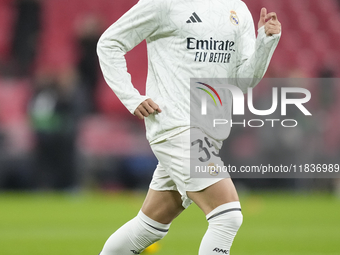 Raul Asencio centre-back of Real Madrid and Spain during the warm-up before the La Liga match between Athletic Club and Real Madrid CF at Es...