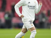 Raul Asencio centre-back of Real Madrid and Spain during the warm-up before the La Liga match between Athletic Club and Real Madrid CF at Es...