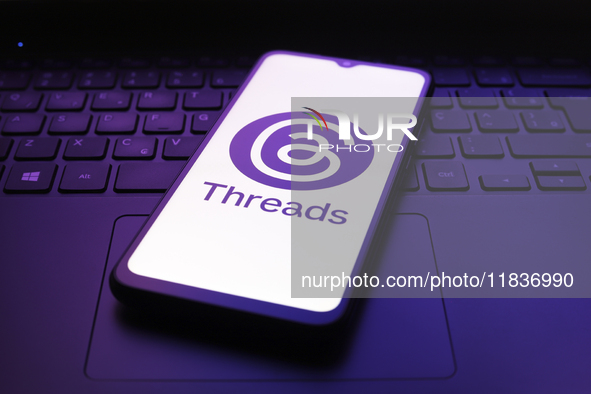 The Threads app logo appears on the screen of a smartphone in Reno, United States, on December 5, 2024. 