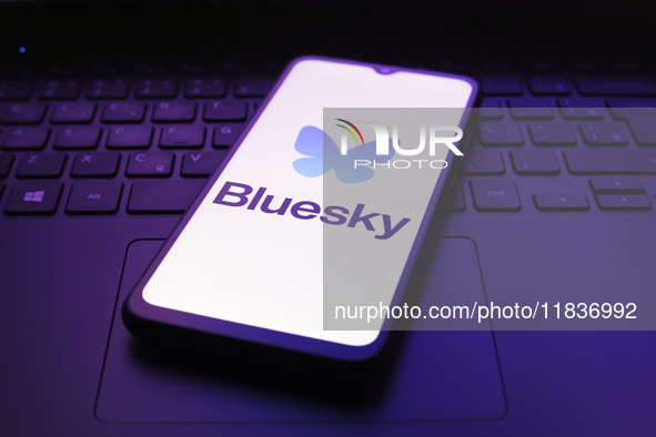 The Bluesky app logo appears on the screen of a smartphone in Reno, United States, on December 5, 2024. 