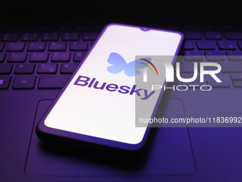 The Bluesky app logo appears on the screen of a smartphone in Reno, United States, on December 5, 2024. (