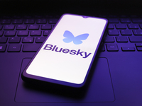 The Bluesky app logo appears on the screen of a smartphone in Reno, United States, on December 5, 2024. (