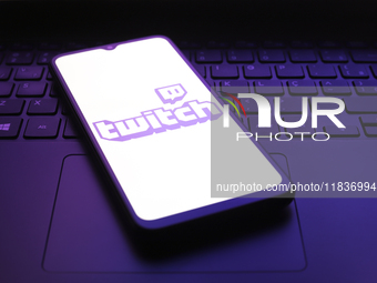 The Twitch app logo appears on the screen of a smartphone in Reno, United States, on December 5, 2024. (