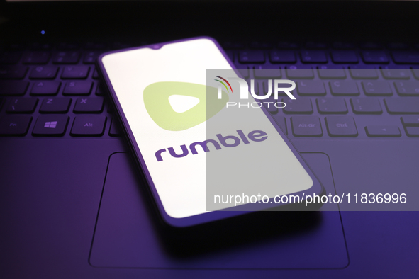 The Rumble app logo appears on the screen of a smartphone in Reno, United States, on December 5, 2024. 