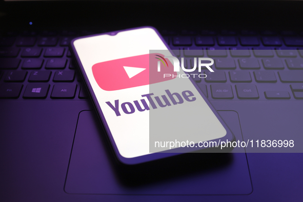 The YouTube app logo appears on the screen of a smartphone in Reno, United States, on December 5, 2024. 