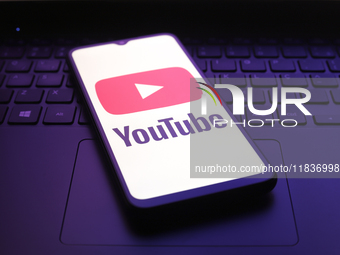 The YouTube app logo appears on the screen of a smartphone in Reno, United States, on December 5, 2024. (