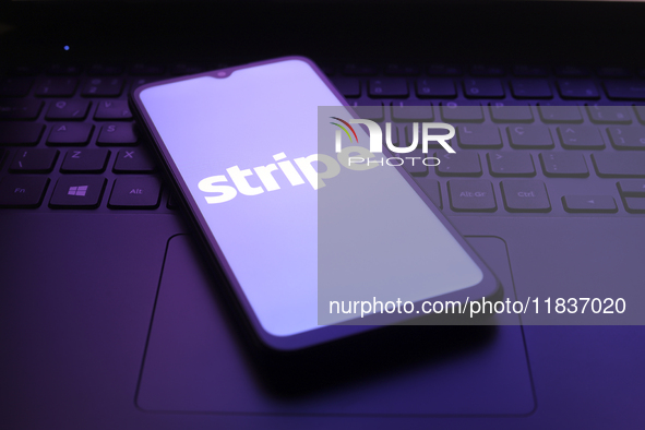 The Stripe logo appears on the screen of a smartphone in Reno, United States, on December 5, 2024. 