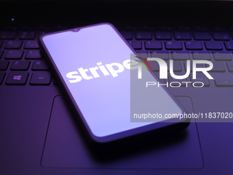 The Stripe logo appears on the screen of a smartphone in Reno, United States, on December 5, 2024. (