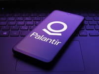 The Palantir Technologies logo appears on the screen of a smartphone in Reno, United States, on December 5, 2024. (