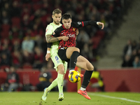 Inigo Martinez centre-back of Barcelona and Spain and Valery Fernandez right winger of Mallorca and Spain compete for the ball during the La...