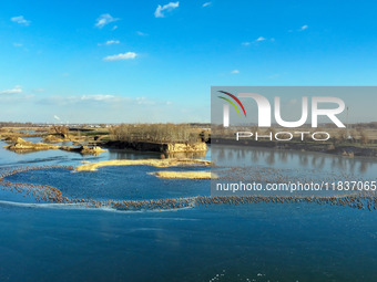 A photo taken on December 5, 2024, shows migrating birds at Qiandao Lake in Hohhot, Inner Mongolia, China. (