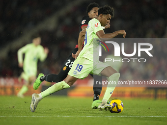 Lamine Yamal right winger of Barcelona and Spain during the La Liga match between RCD Mallorca and FC Barcelona at Estadi de Son Moix on Dec...