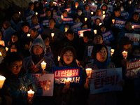 Hundreds of citizens, along with members of the Democratic Party of Korea, gather in front of the National Assembly in Yeouido to participat...